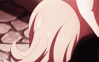 a close up of a person 's tail with a ponytail .