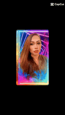 a woman 's face is displayed in a colorful frame with a capcut logo in the corner