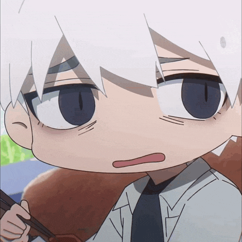 a close up of a person 's face with white hair