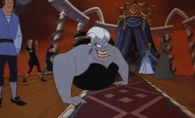 a cartoon character from the little mermaid is sitting on a couch .