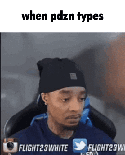 a man sitting in a chair with the words when pdzn types