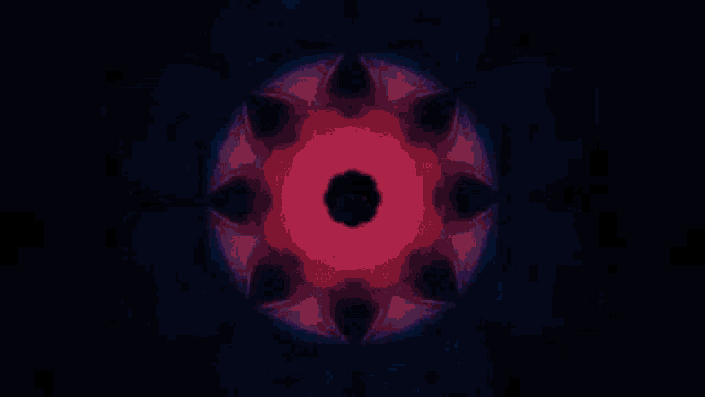 a kaleidoscope shows a pink flower in the center