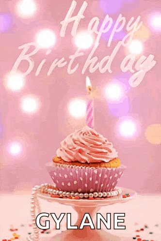 a pink cupcake with a pink candle and the name gylane on the bottom