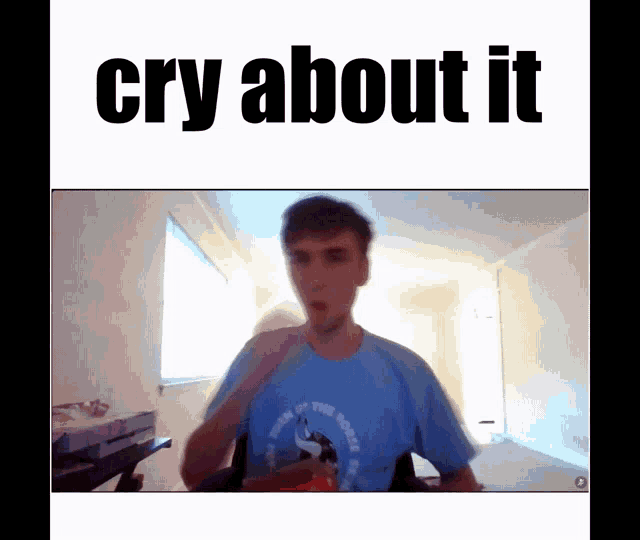 a man in a blue shirt with the words cry about it on the bottom