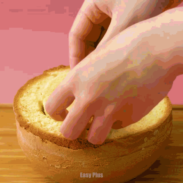 a person is cutting a piece of bread with the words easy plus written on the bottom