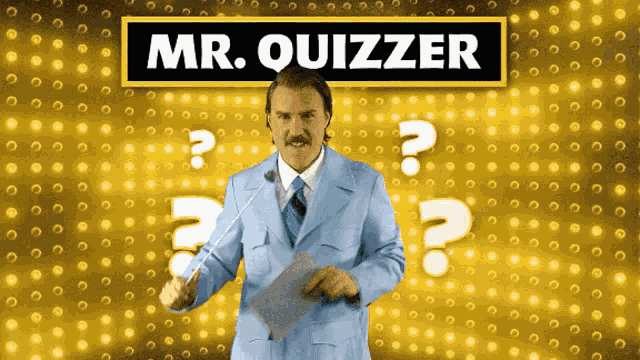 a man in a suit and tie is holding a microphone in front of a sign that says mr. quizzer