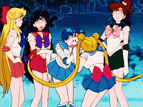 a group of anime characters standing next to each other including sailor moon