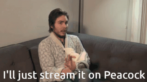 Man Carrying Thing Peacock GIF - Man Carrying Thing Peacock Streaming GIFs