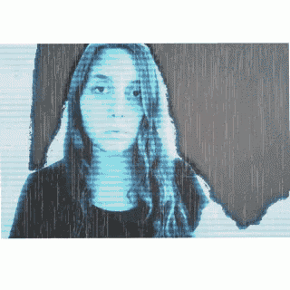 a woman 's face is shown in a blue and white image