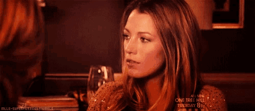 a close up of a woman 's face with the words one tree hill on the bottom left