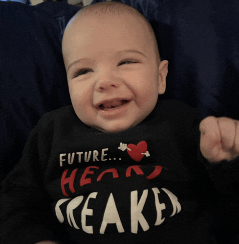 a baby wearing a black shirt that says future heart cracked