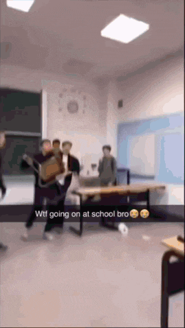 a group of people in a classroom with the words wtf going on at school bro
