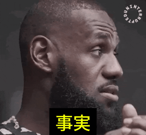 a close up of a man 's face with the word dunkin ' on it
