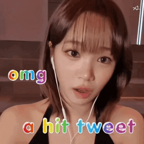 a girl wearing earbuds says omg a hit tweet