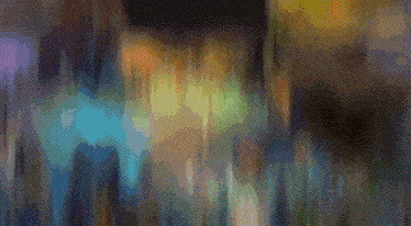 a blurry picture of a painting with a few spots of light on it