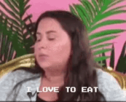 a woman is sitting in a chair with her eyes closed and the words `` i love to eat '' written above her .
