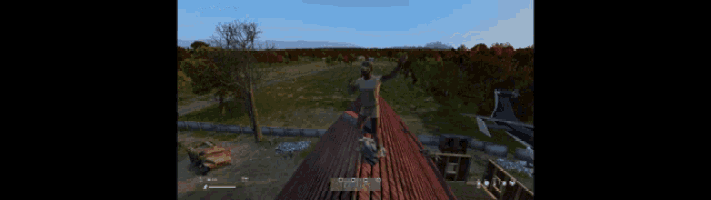 a computer screen shows a man standing on a roof