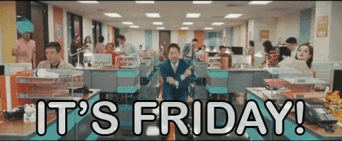 a man in an office with the words it 's friday