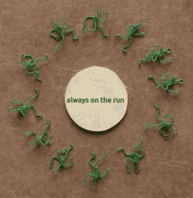 a circle of green frogs with always on the run written on the center