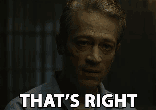 a man says that 's right next to a dark background