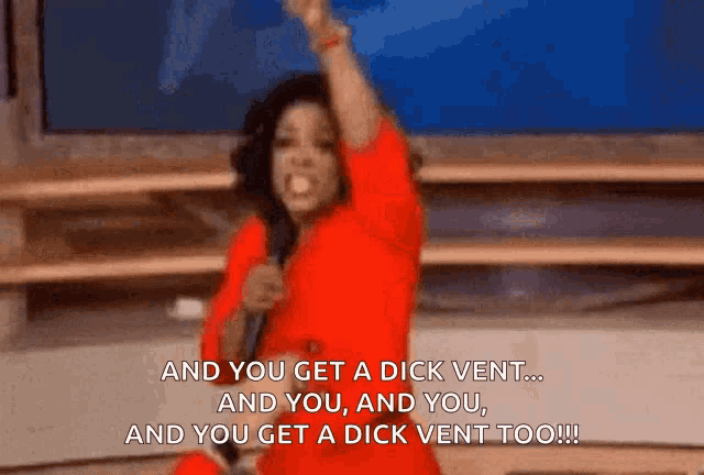 a woman in a red dress holds a microphone and says " and you get a dick vent and you and you "