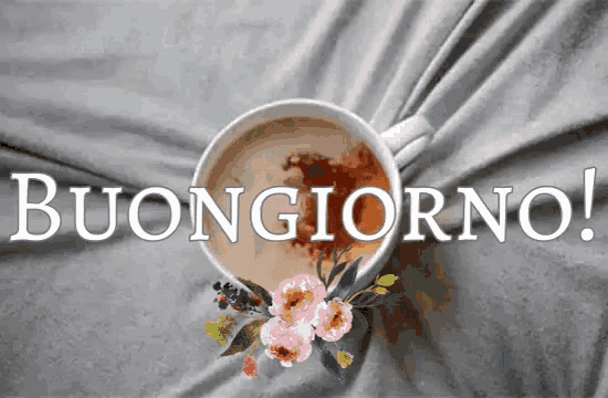 a cup of coffee with flowers and the words buongiorno written above it