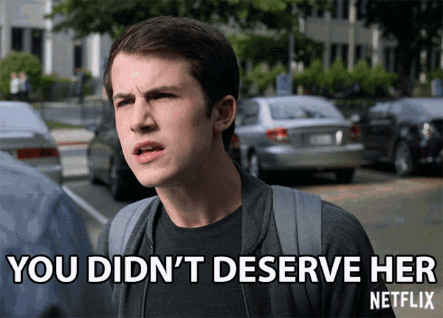 a man with a backpack stands in front of a sign that says you didn 't deserve her netflix