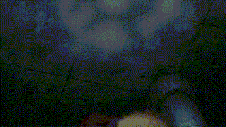 a cartoon character is standing in a dark room