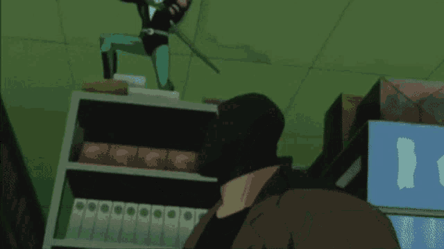 a man in a black mask is standing in front of a shelf with binders