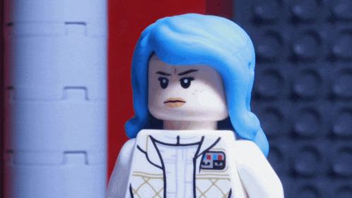 a lego figure with blue hair and a white suit has a badge on her chest that says ep