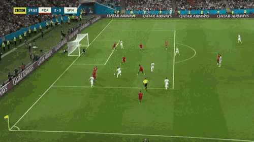 a soccer game is being played on a field with qatar airways advertisements on the sidelines