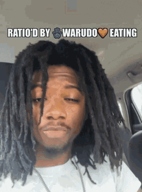 a man with dreadlocks is sitting in a car with the words ratio d by warudo eating above him