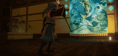 a man with long blue hair is standing in front of a painting