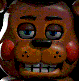 a close up of a teddy bear with his tongue out
