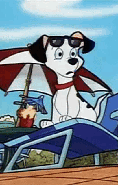 a dalmatian dog wearing sunglasses sits under an umbrella on a beach chair