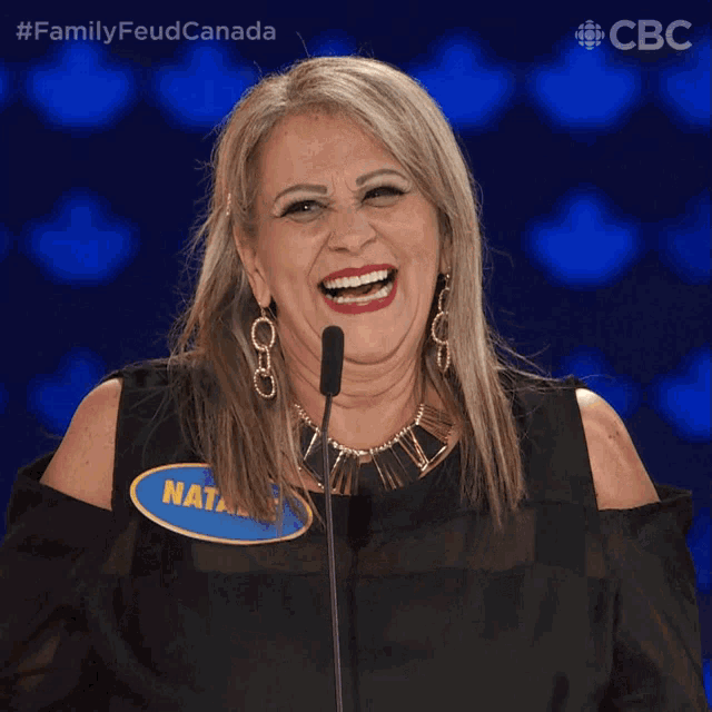 Laughing Family Feud Canada GIF - Laughing Family Feud Canada Shrug GIFs