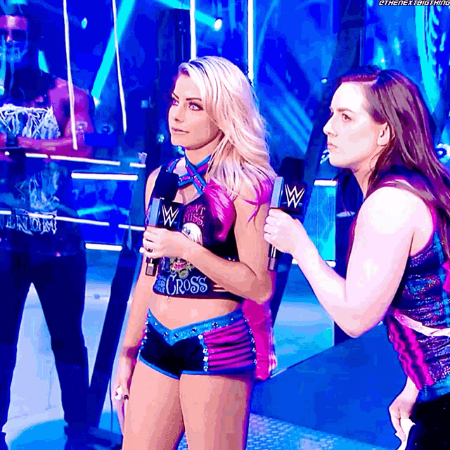 a woman in a wrestling outfit with the word cross on her shirt