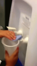 Girl Can'T Figure Out The Water Cooler GIF - Water Cooler Girl GIFs