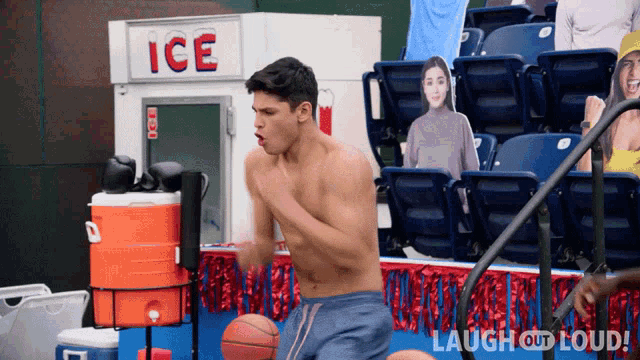 a shirtless man is playing basketball in front of a sign that says ice
