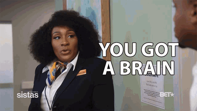 a woman says you got a brain in front of a sign