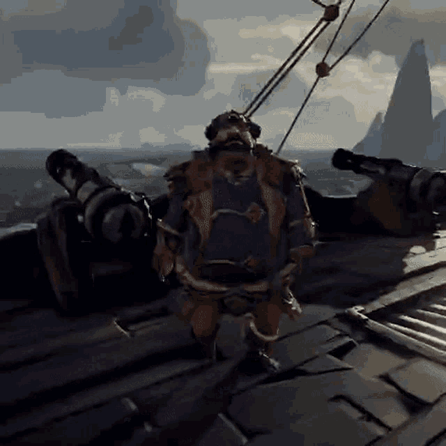 a man with a beard is standing on the deck of a boat .