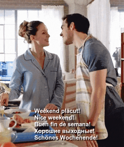 a man and a woman are kissing in a kitchen with the words weekend placut in the upper right corner