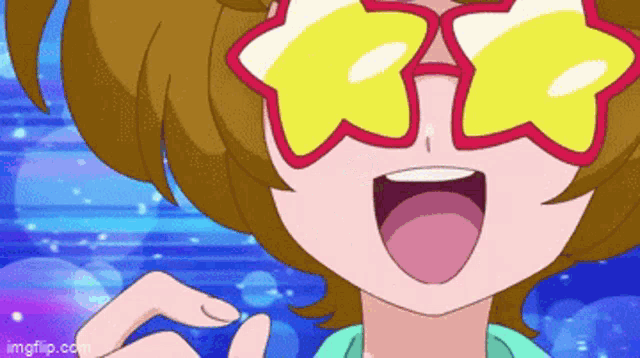 a girl wearing star shaped sunglasses is smiling and making a heart shape with her hand
