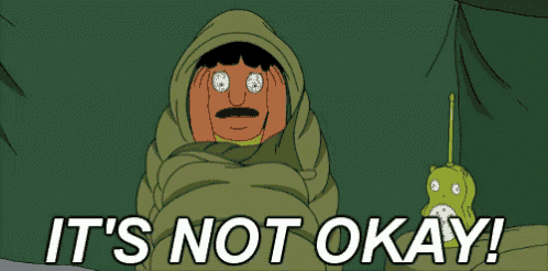 a cartoon of a man wrapped in a sleeping bag with the words it 's not okay below him
