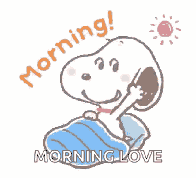 snoopy is laying in bed with a blue blanket and a sun .