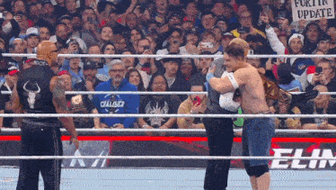 a wrestling ring with a sign that says fortin update on it