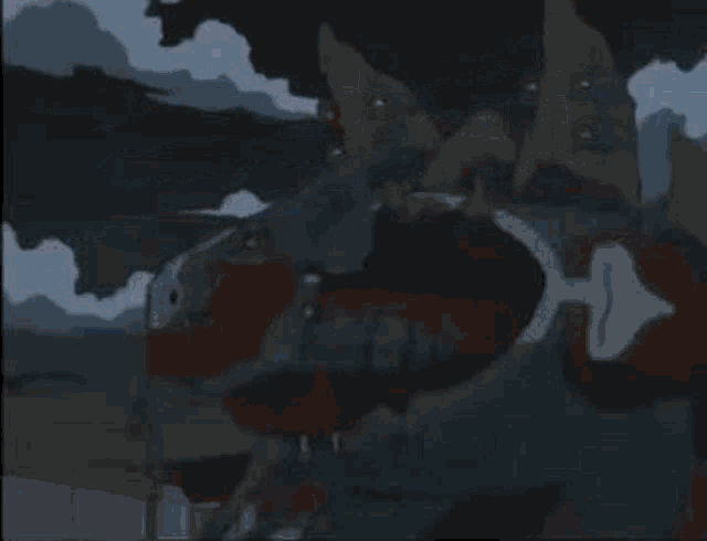 a cartoon character is being attacked by two blue lasers coming out of his eyes .