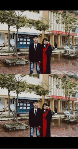 a man and a woman pose for a picture in front of a building that says ' a ' on it