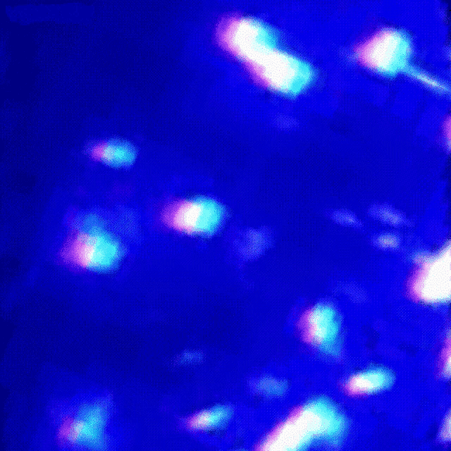 a blue background with a lot of different colored lights coming out of it