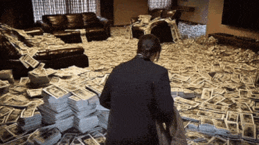 a woman is standing in front of a pile of money that says 20 on it